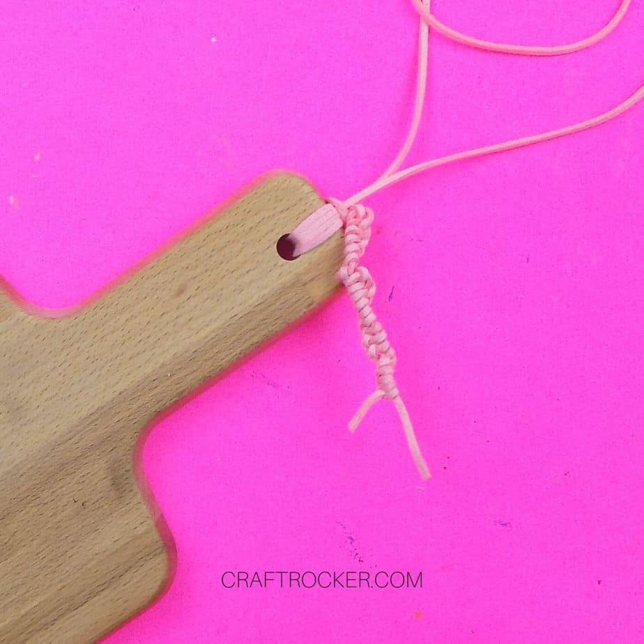 Close up of Knotted Cording attached to Wood Burned Cutting Board - Craft Rocker