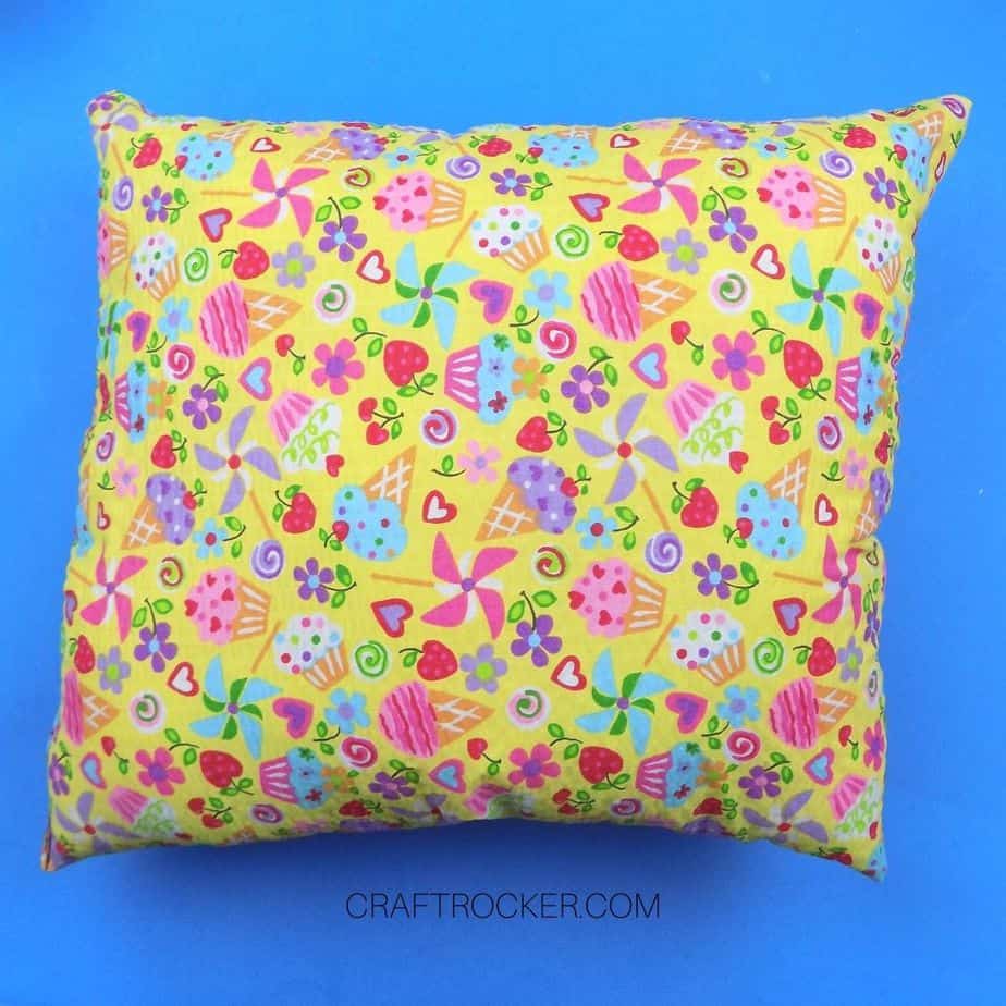 Colorful Sewn Pillow on Blue Background - Craft Rocker