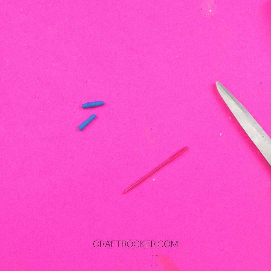 Paper Beads Next to Plastic Needle - Craft Rocker