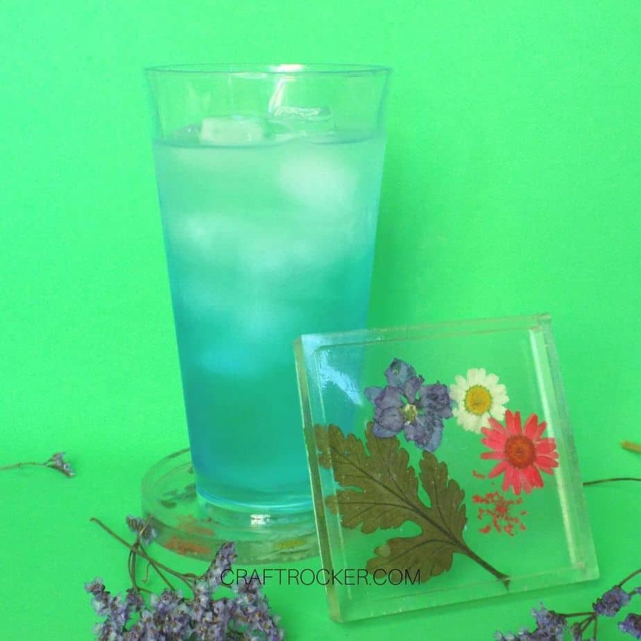 Pressed Flower Resin Coaster Leaning Against Cup - Craft Rocker