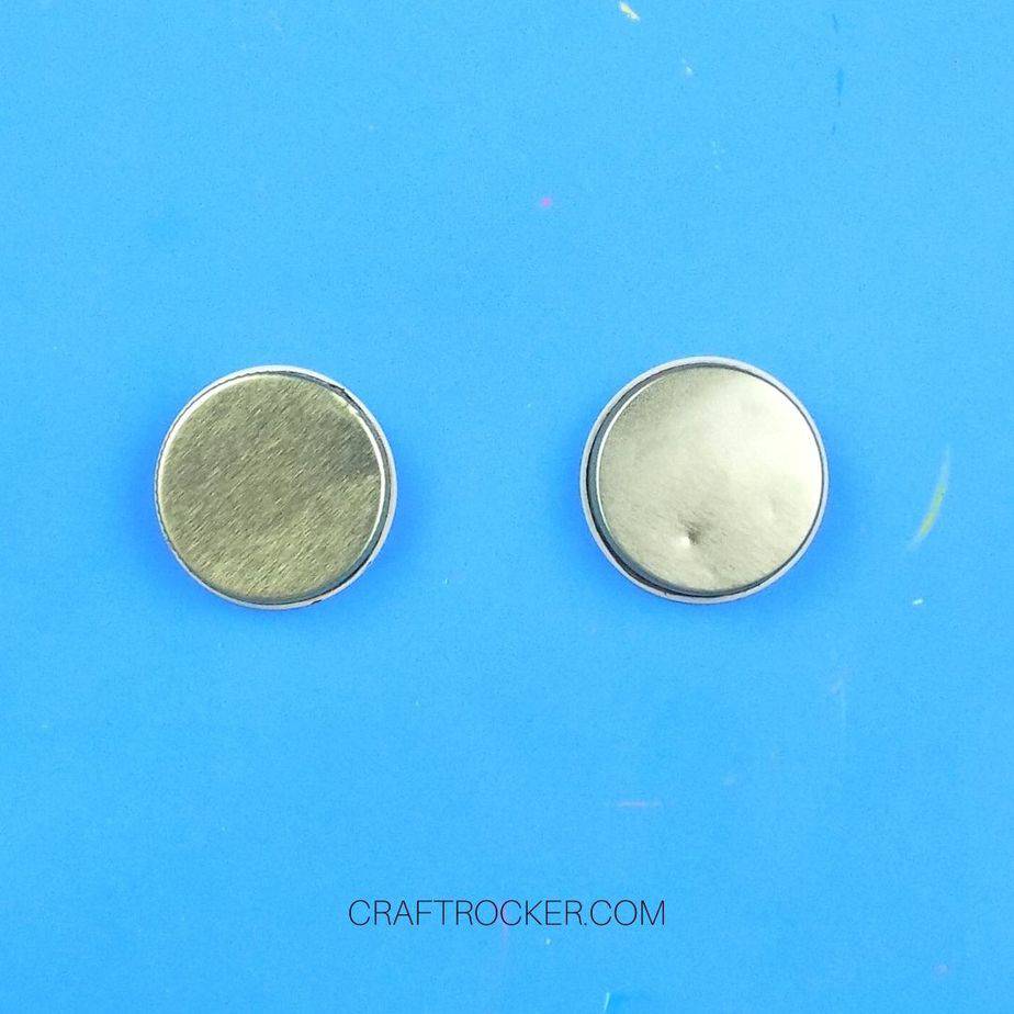 Close Up of 2 Metal Lids on Blue Background - Craft Rocker