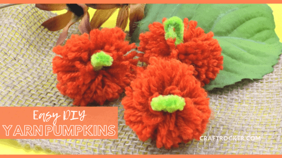 Yarn Pumpkins on Burlap with Flowers with text overlay - Easy DIY Yarn Pumpkins - Craft Rocker