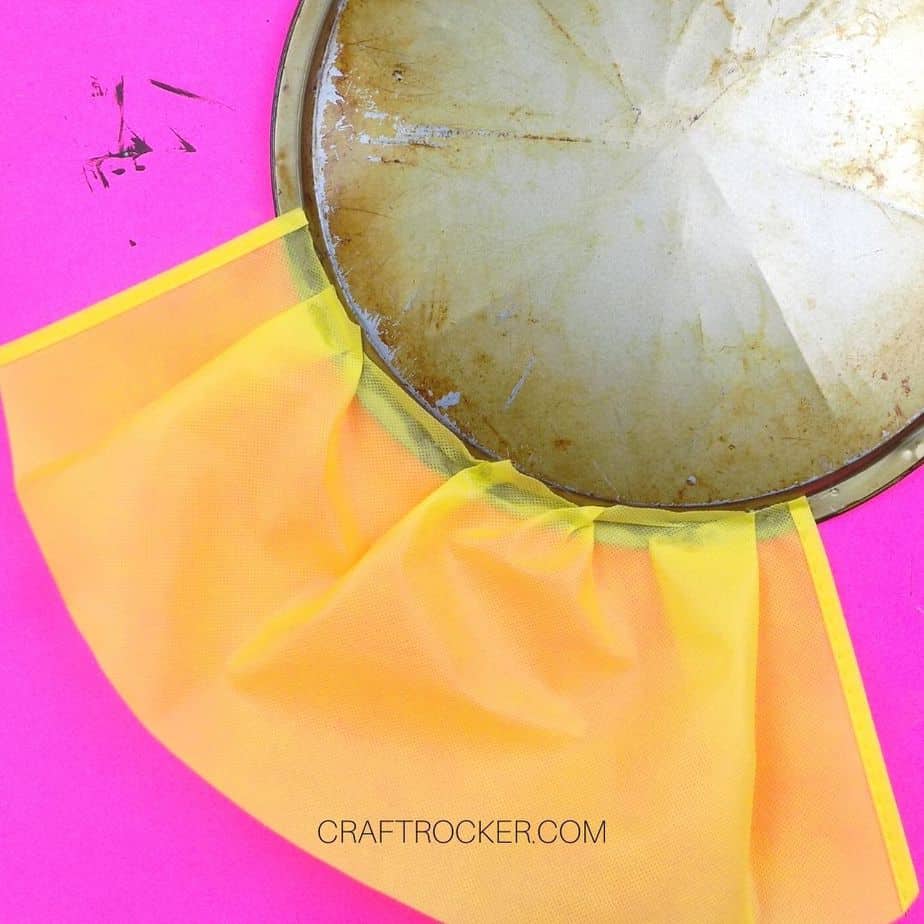 Yellow Fabric Glued to Back of Pizza Pan - Craft Rocker