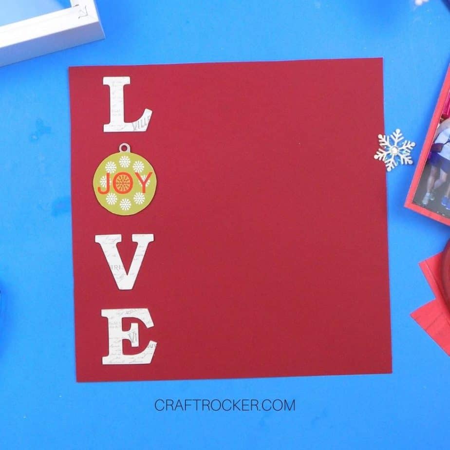 Chipboard Letters L - O - V - E on the Left Side of a Piece of Red Cardstock - Craft Rocker