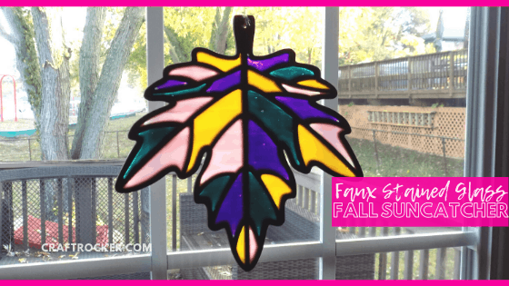 Close Up of Fall Leaf Suncatcher on Window with text overlay - Faux Stained Glass Fall Suncatcher - Craft Rocker