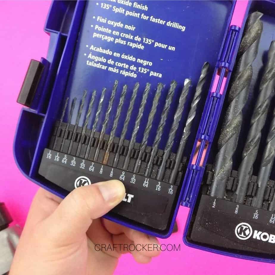 Close Up of Hand Holding Drill Bits Organizer - Craft Rocker