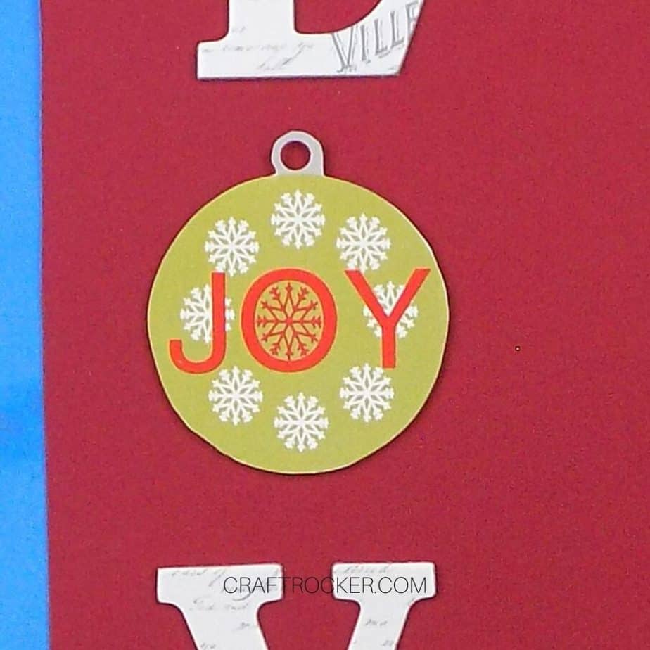 Close Up of Paper Ornament on Red Cardstock - Craft Rocker