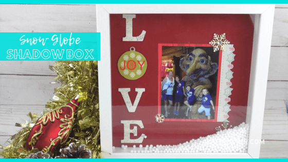 Close Up of Shadow Box on Wood Background with text overlay - Snow Globe Shadow Box - Craft Rocker