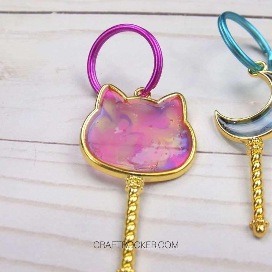 Close Up of UV Cat Keychain on Wood Background - Craft Rocker