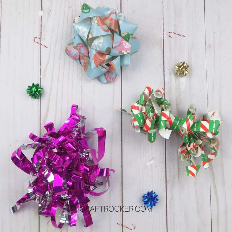 3 Different Styles of Wrapping Paper Bows on Wood Background - Craft Rocker