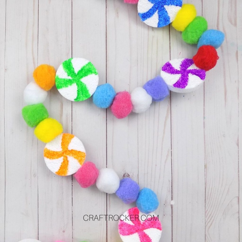 Candy Pompom Garland on Wood Background - Craft Rocker