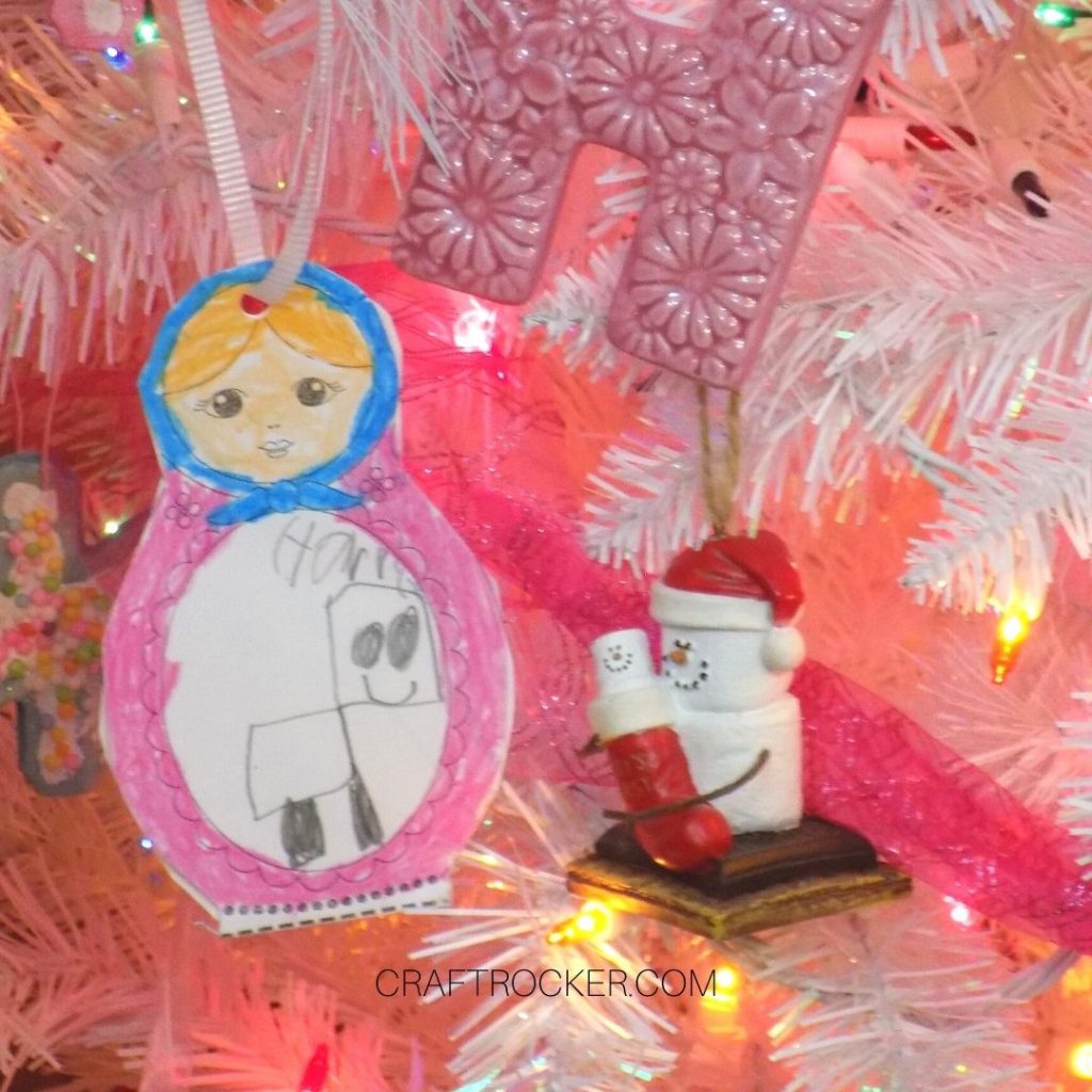 Close Up of Nesting Doll Ornament and Smores Ornament on Candy Christmas Tree - Craft Rocker