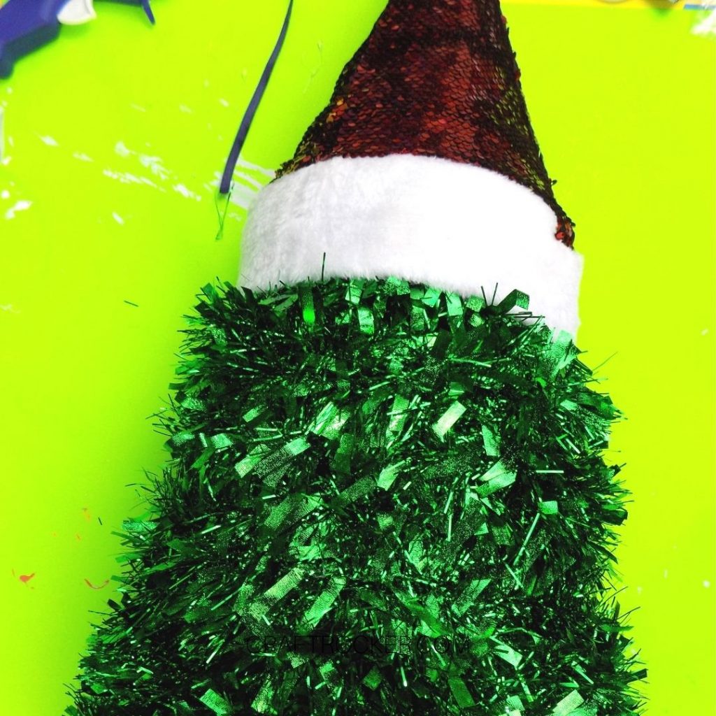 Close Up of Santa Hat on Garland Covered Cone - Craft Rocker