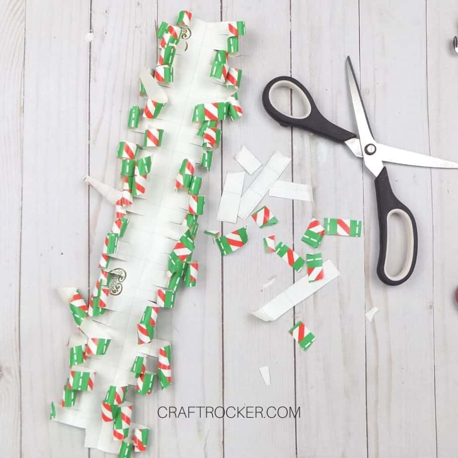 Curled Fringes of Wrapping Paper next to Scissors - Craft Rocker