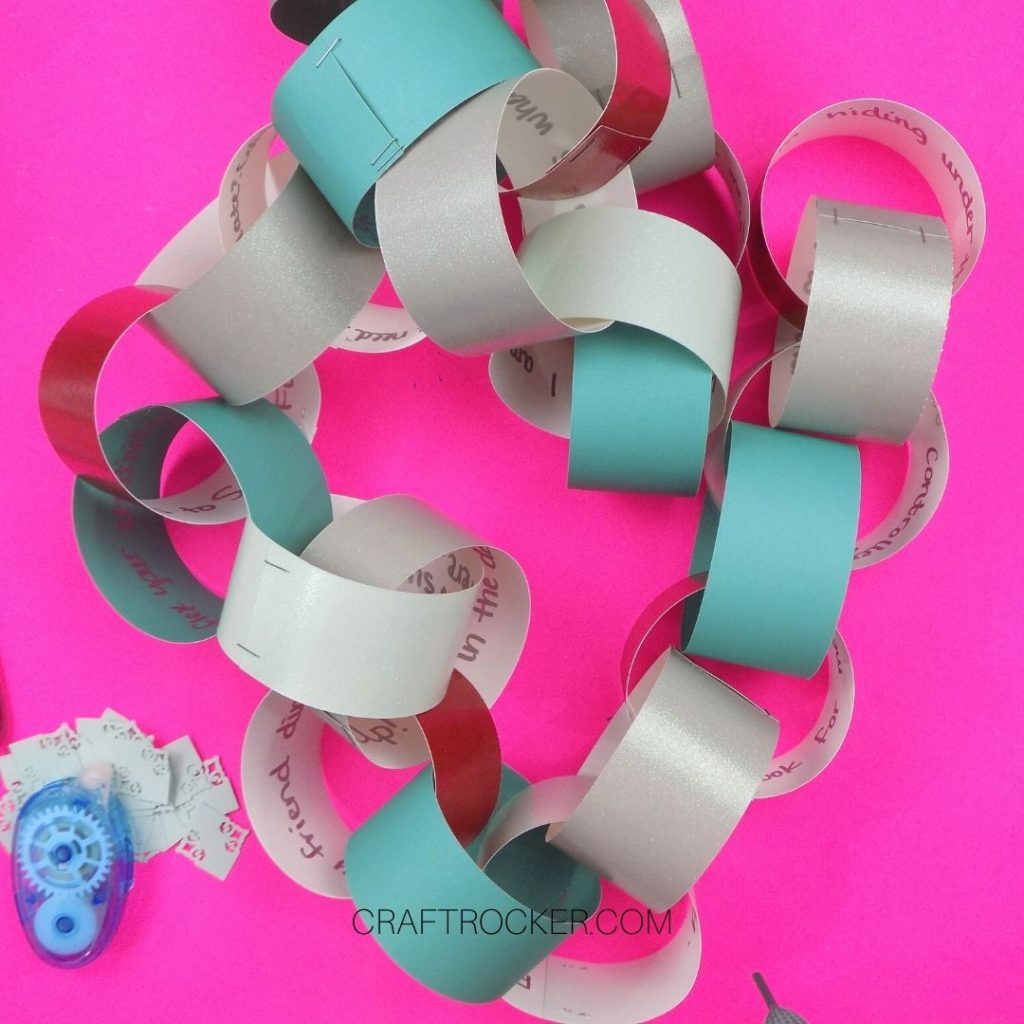 Finished Paper Chain on Pink Background - Craft Rocker