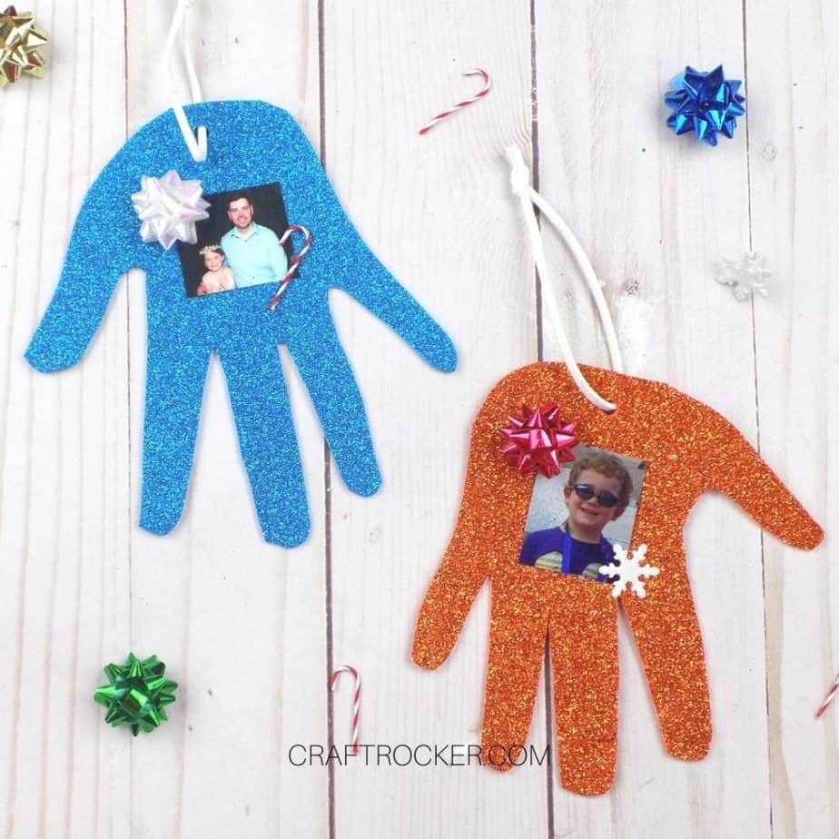 Glitter Handprint Ornaments on Wood Background - Craft Rocker