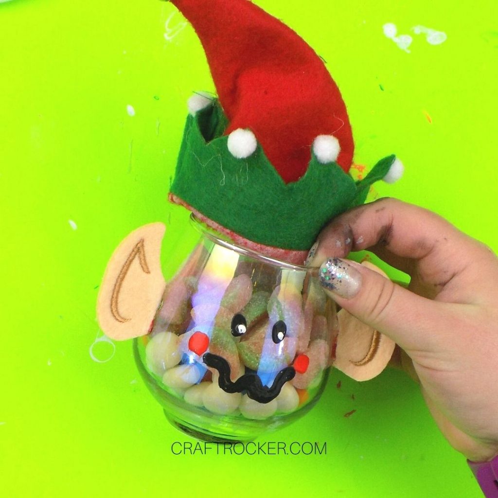 Hand Holding Elf Treat Jar with Candy Inside - Craft Rocker