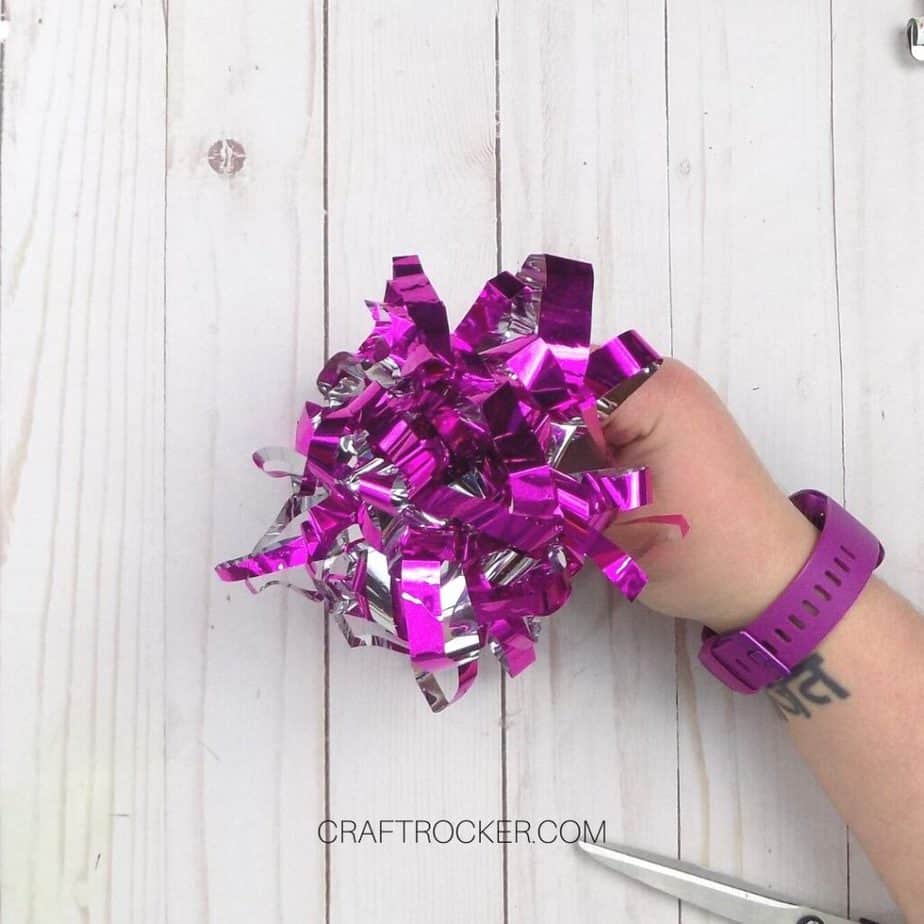 How to Make a Bow out of Wrapping Paper - Craft Rocker