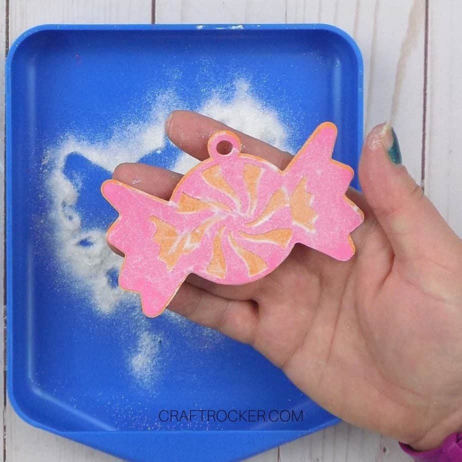 Hand Holding Glitter Paper Candy - Craft Rocker