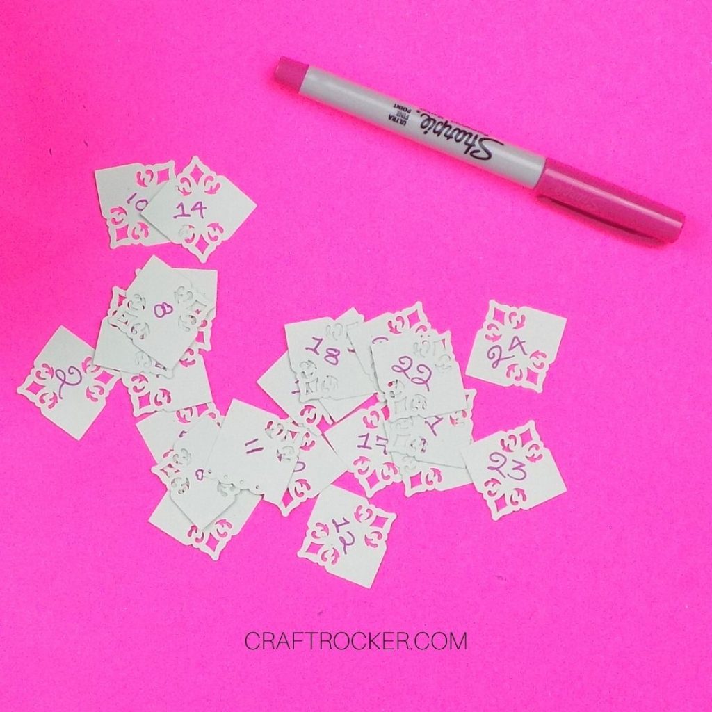 Numbered Decorative Squares next to Sharpie Marker - Craft Rocker