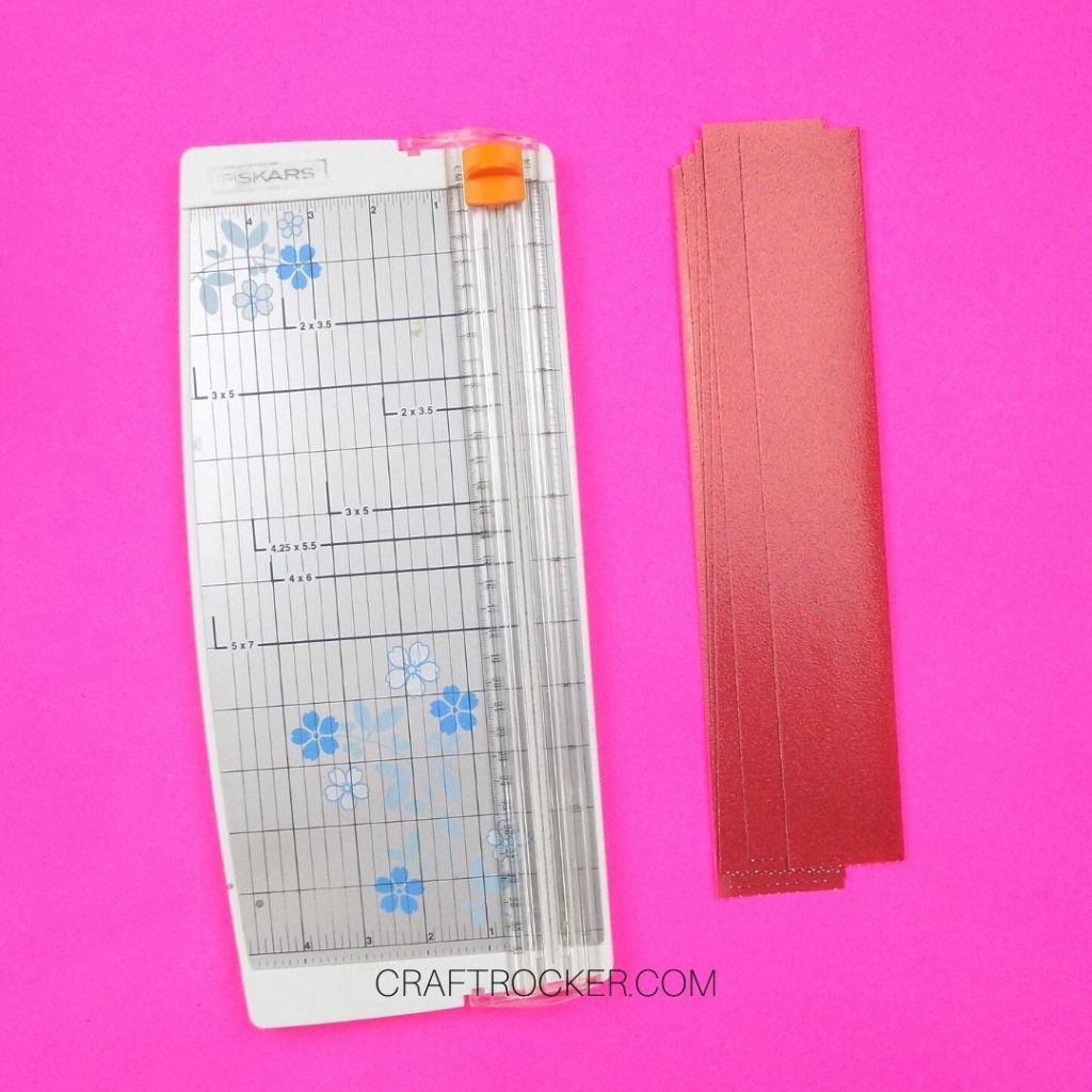 Paper Cutter Next to Strips of Cardstock - Craft Rocker