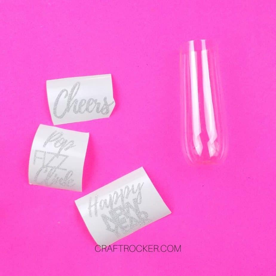 Glitter Vinyl Sayings next to Plastic Champagne Flute - Craft Rocker