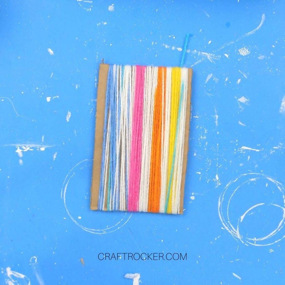 Rainbow Yarn Wrapped Around Cardboard Rectangle - Craft Rocker