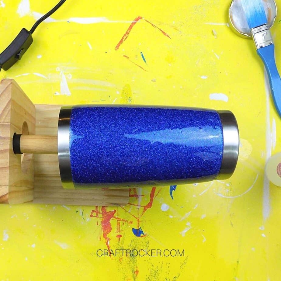 Resin Covered Blue Glitter Tumbler on Cup Turner Dowel Rod - Craft Rocker