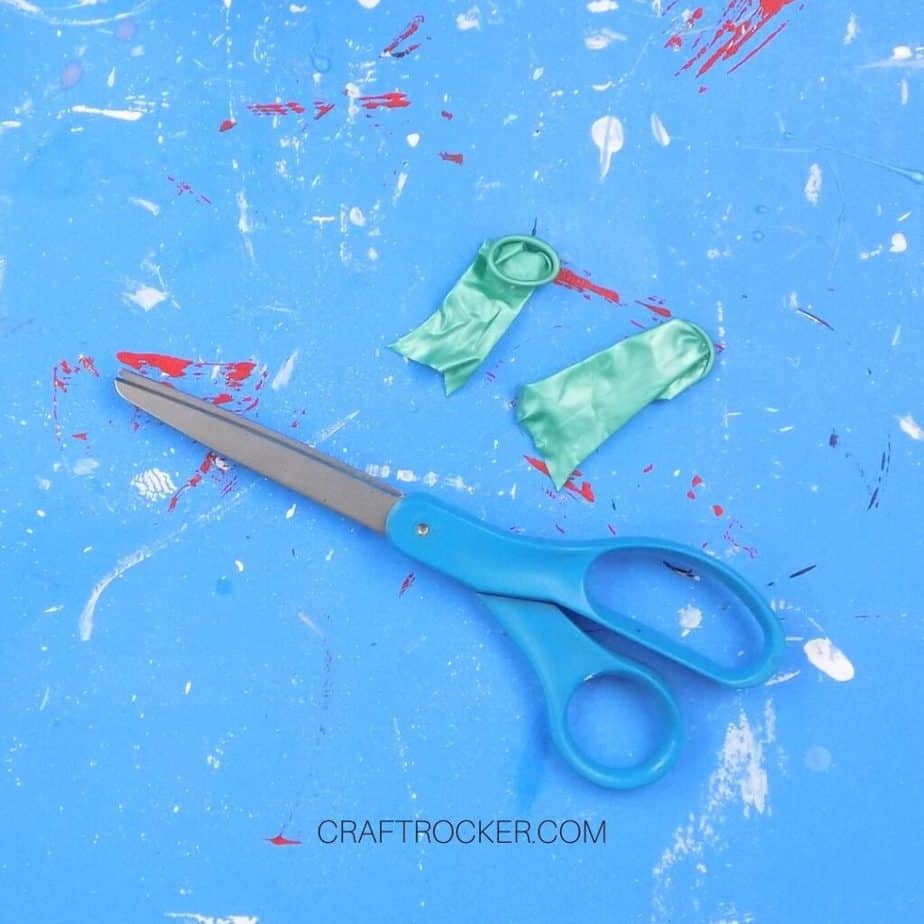 Scissors Next to Cut Pieces of Balloons - Craft Rocker