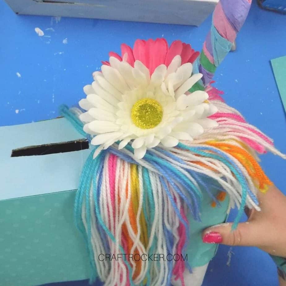 White Flower Glued to Yarn Around Horn - Craft Rocker