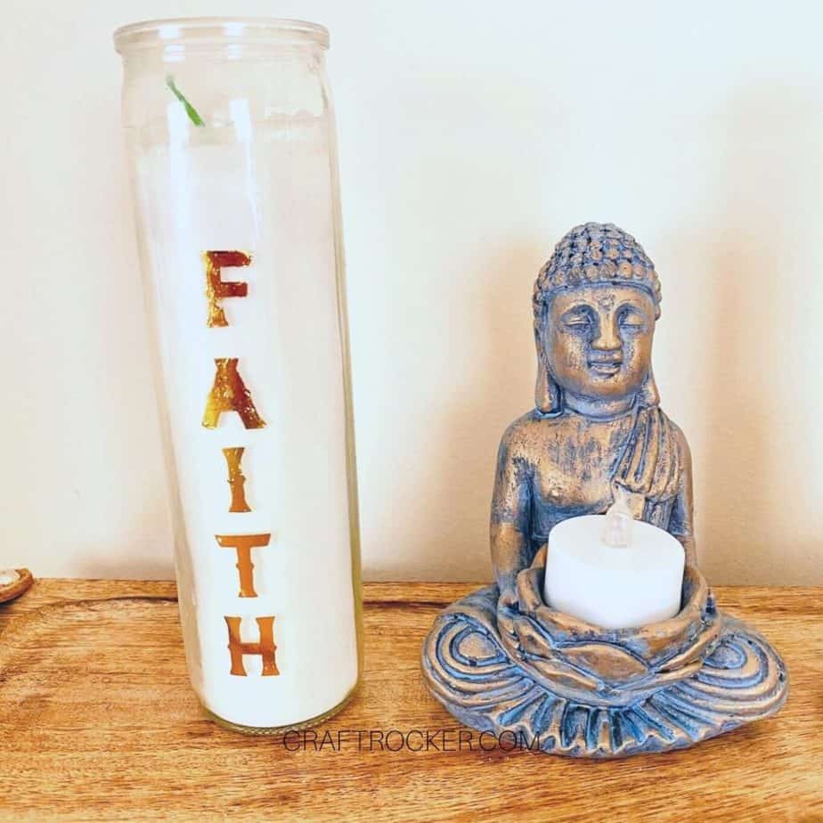 Faith Candle next to Statue - Craft Rocker