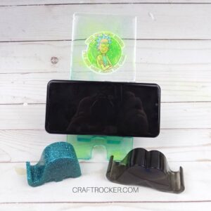 Phone on Rick Phone Holder next to Elephant and Mustache Holders - Craft Rocker