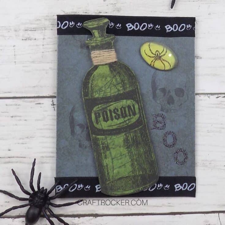 Close Up of Poison Bottle Card next to Spiders - Craft Rocker