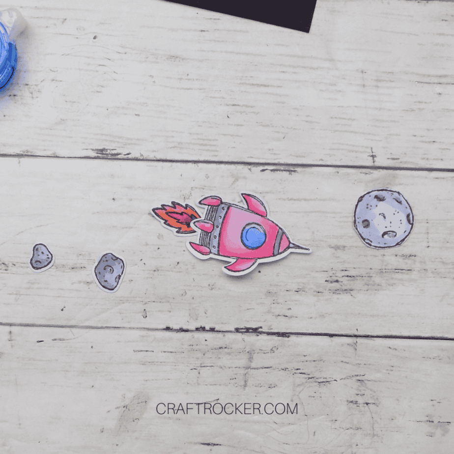 Close Up of Die Cut Spaceship with Flames Glued to It - Craft Rocker