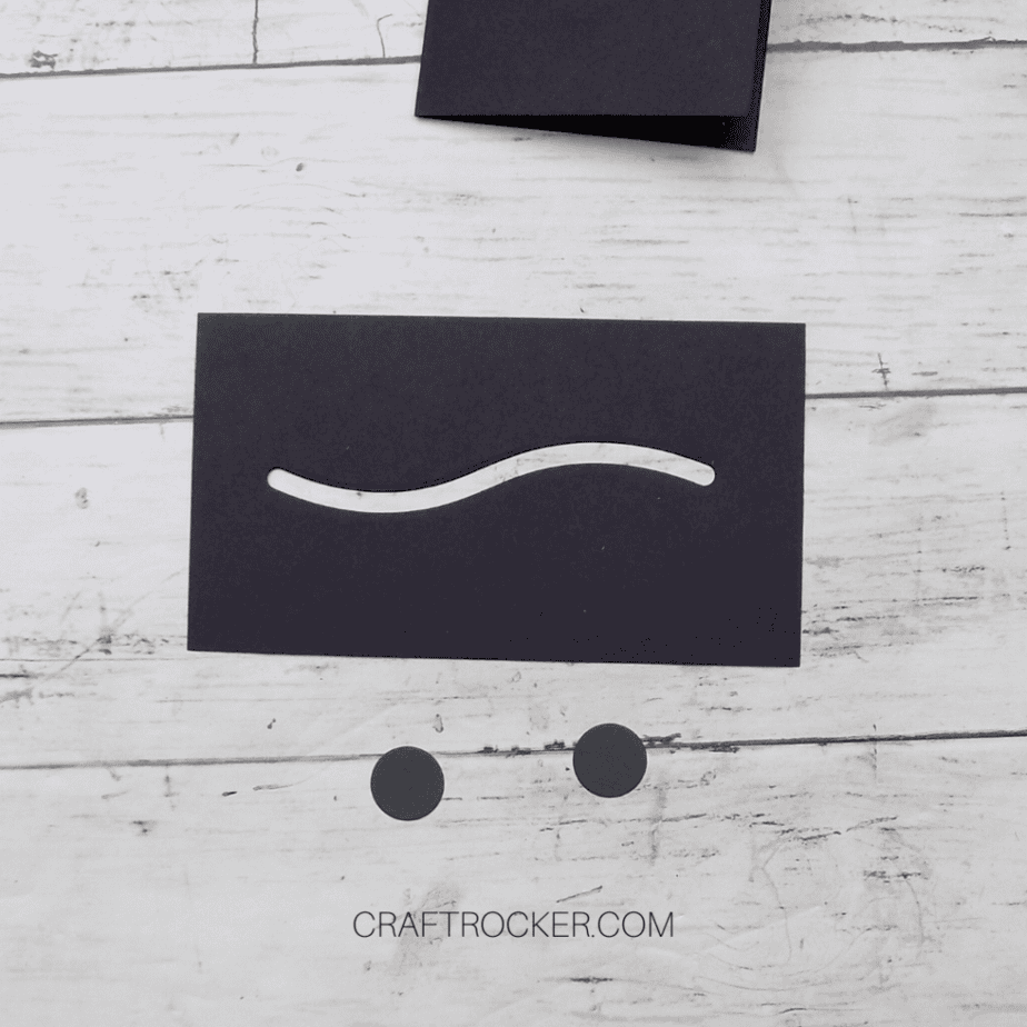 Die Cut Black Cardstock Pieces on Wood Background - Craft Rocker