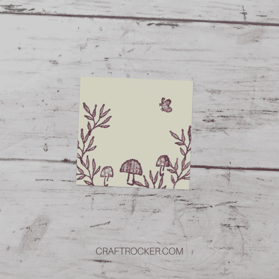 Leaves, Mushrooms, and Butterfly Stamped on Square of Cream Cardstock - Craft Rocker